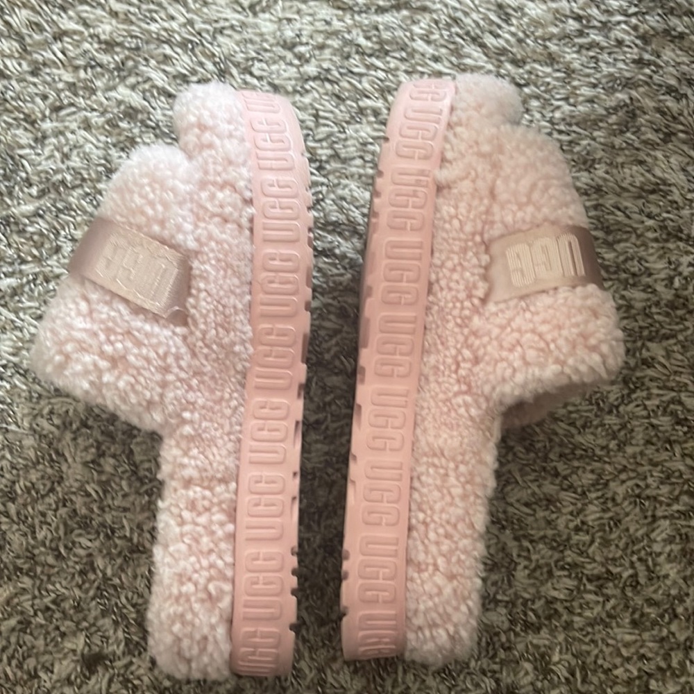 Pink Ugg platform slippers